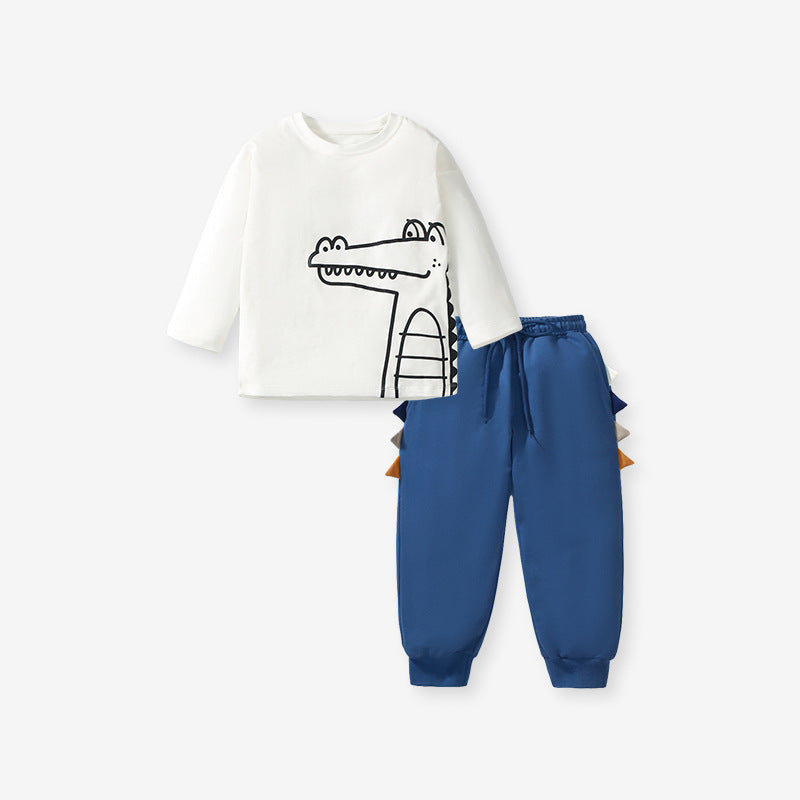 A beige long sleeves top for boys featuring a playful alligator cartoon pattern, made from soft cotton, perfect for spring and autumn wear.