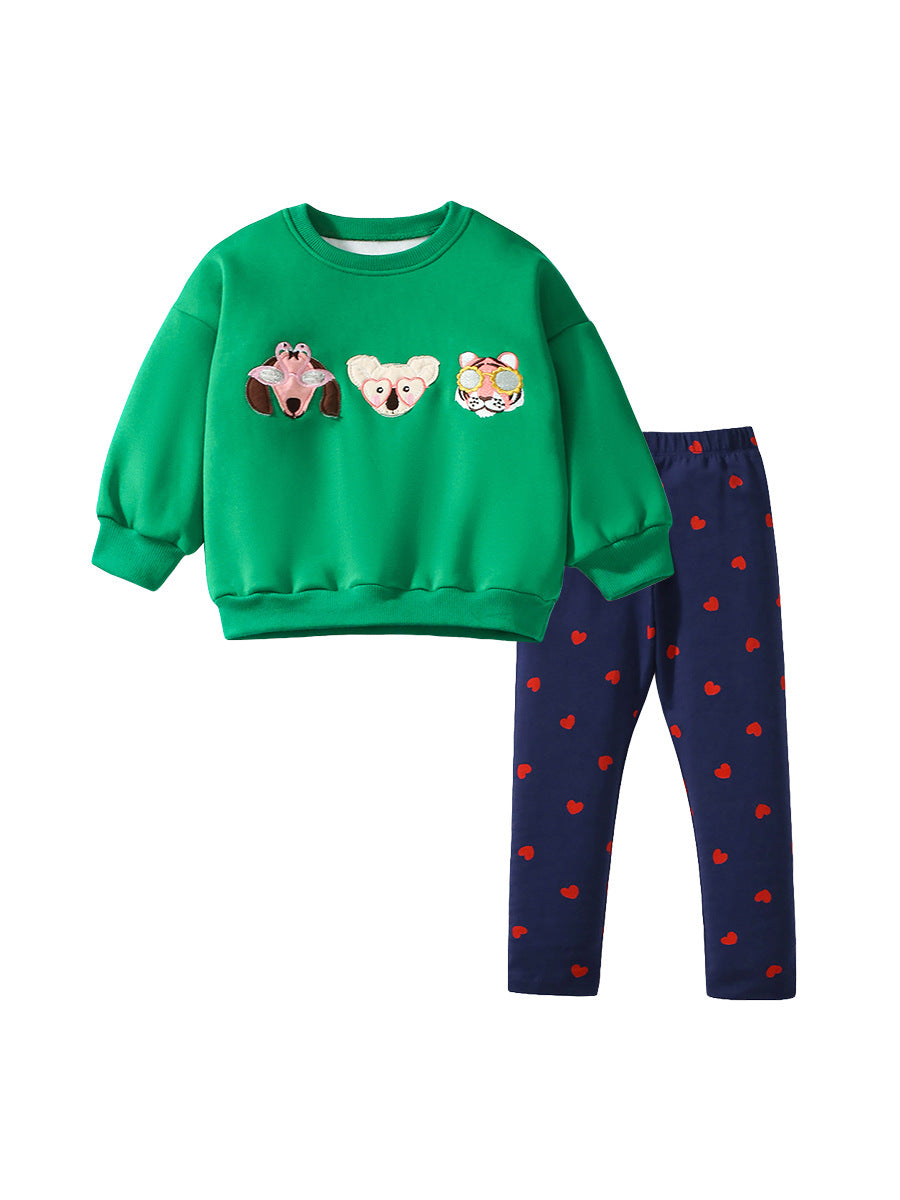 A green long sleeves top for girls featuring cute cartoon animal patterns, perfect for spring and autumn wear.