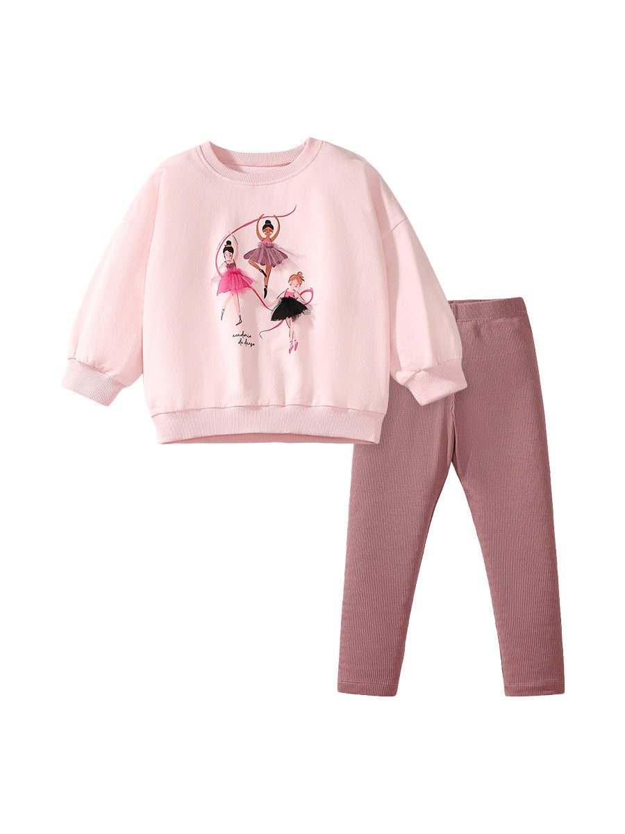 A pink long sleeve crew neck top featuring a cartoon dancer pattern, designed for girls aged 12 months to 10 years.