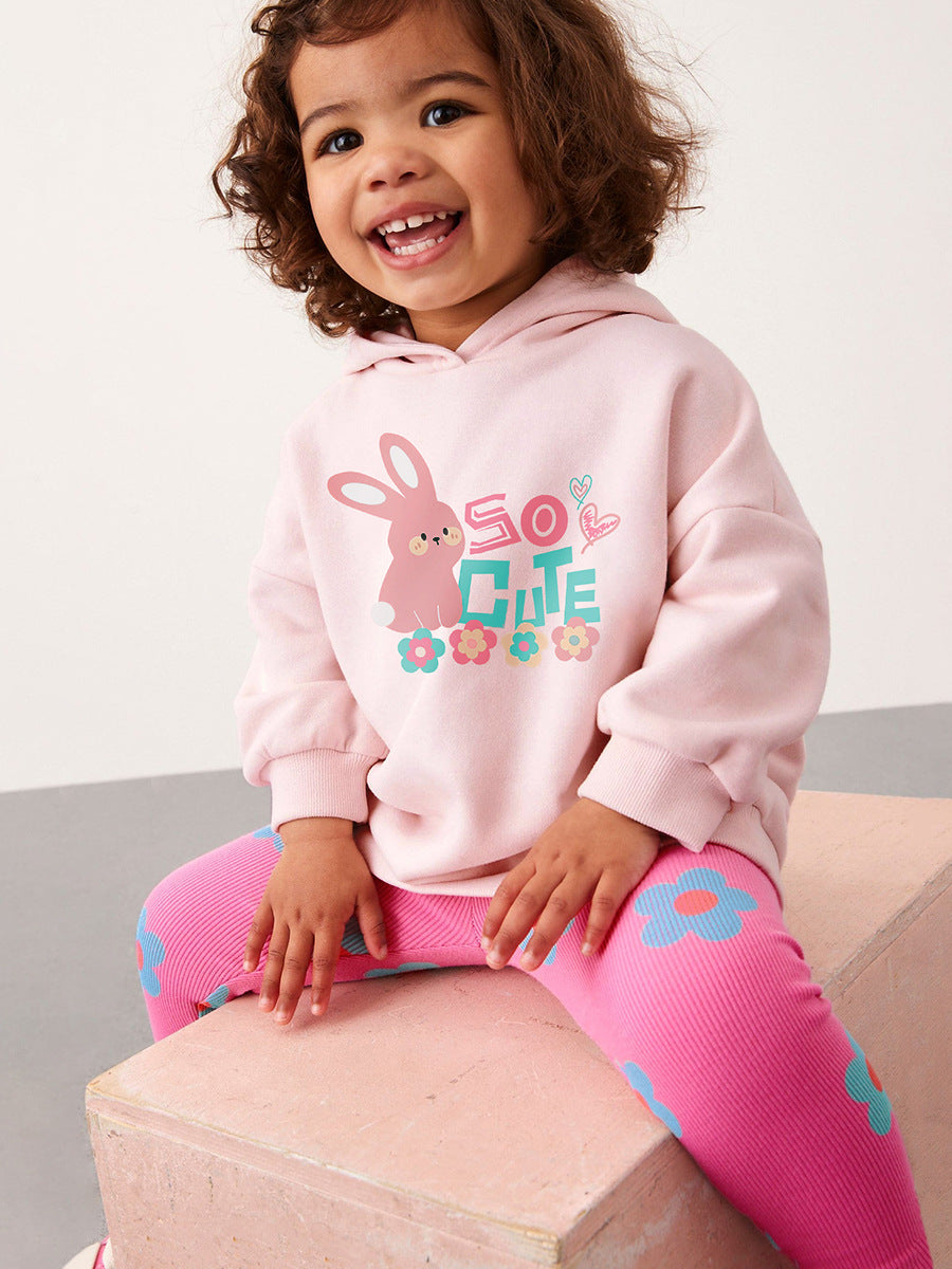 A pink long sleeves top featuring a cute cartoon rabbit pattern, perfect for girls in spring and autumn.