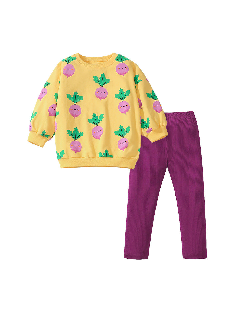 A bright yellow long sleeves top featuring a cute turnip cartoon pattern, designed for girls aged 12 months to 10 years.