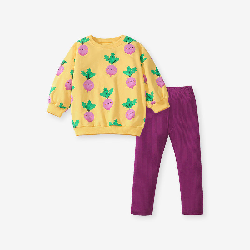 A bright yellow long sleeves top featuring a cute turnip cartoon pattern, designed for girls aged 12 months to 10 years.