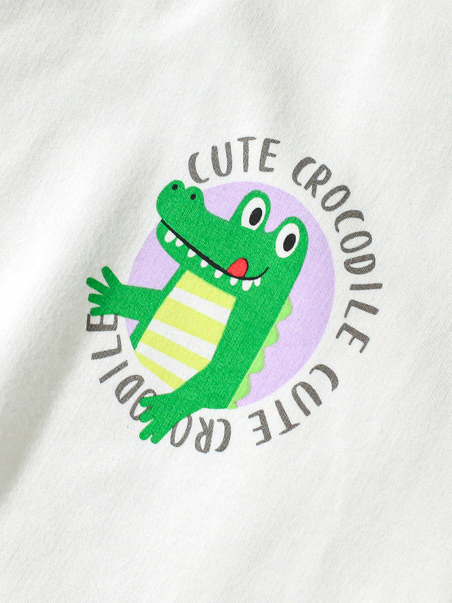 A white long sleeves crew neck for girls featuring a simple crocodile logo, made from a soft cotton and polyester blend.