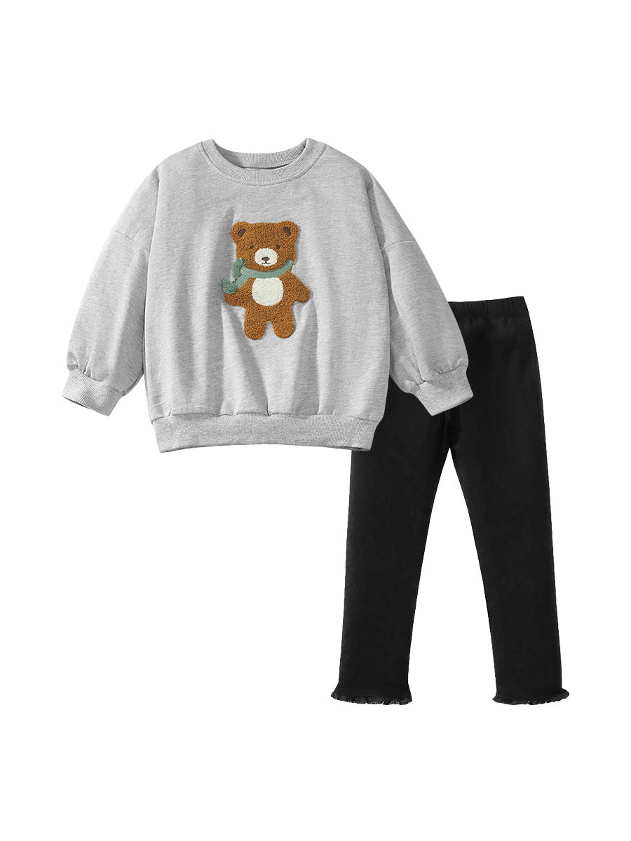 A grey long-sleeve sweatshirt for girls featuring a cute teddy bear cartoon pattern, made from soft cotton and polyester blend.