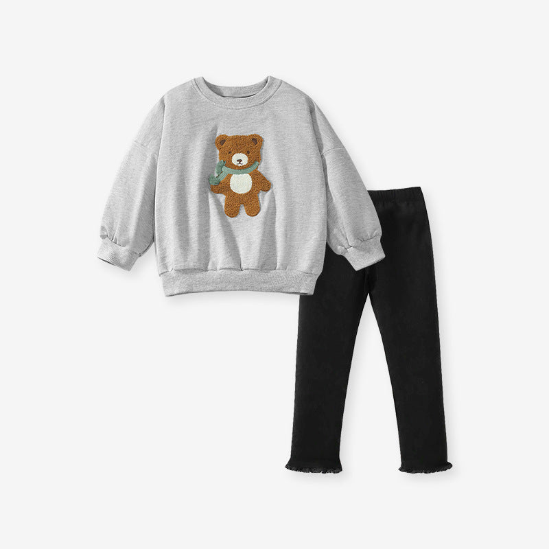 A grey long-sleeve sweatshirt for girls featuring a cute teddy bear cartoon pattern, made from soft cotton and polyester blend.