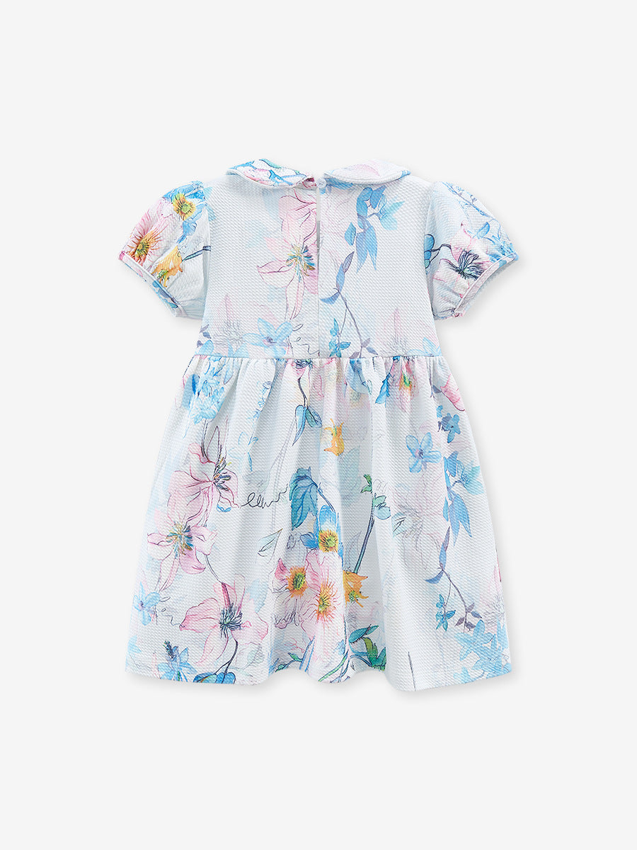 A beautiful white floral dress for baby girls featuring a Peter Pan collar and short sleeves, perfect for spring and summer wear.