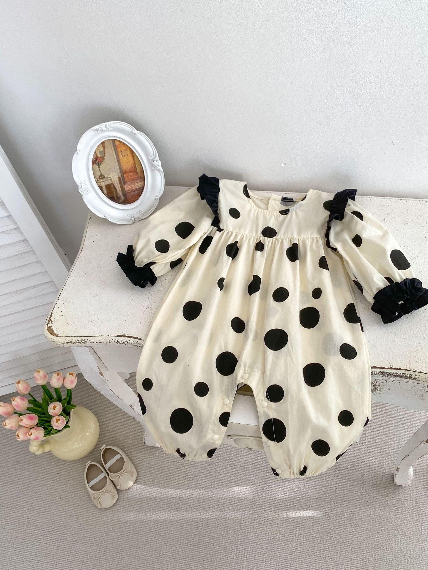 Spring Baby Girls Polka Dots Romper in beige with black leather shoes, showcasing a playful design perfect for spring and autumn.