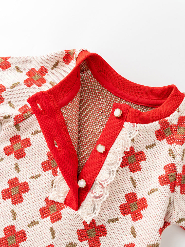 A vibrant red floral knitted romper for baby girls, featuring a crew neck design, perfect for spring and autumn wear.