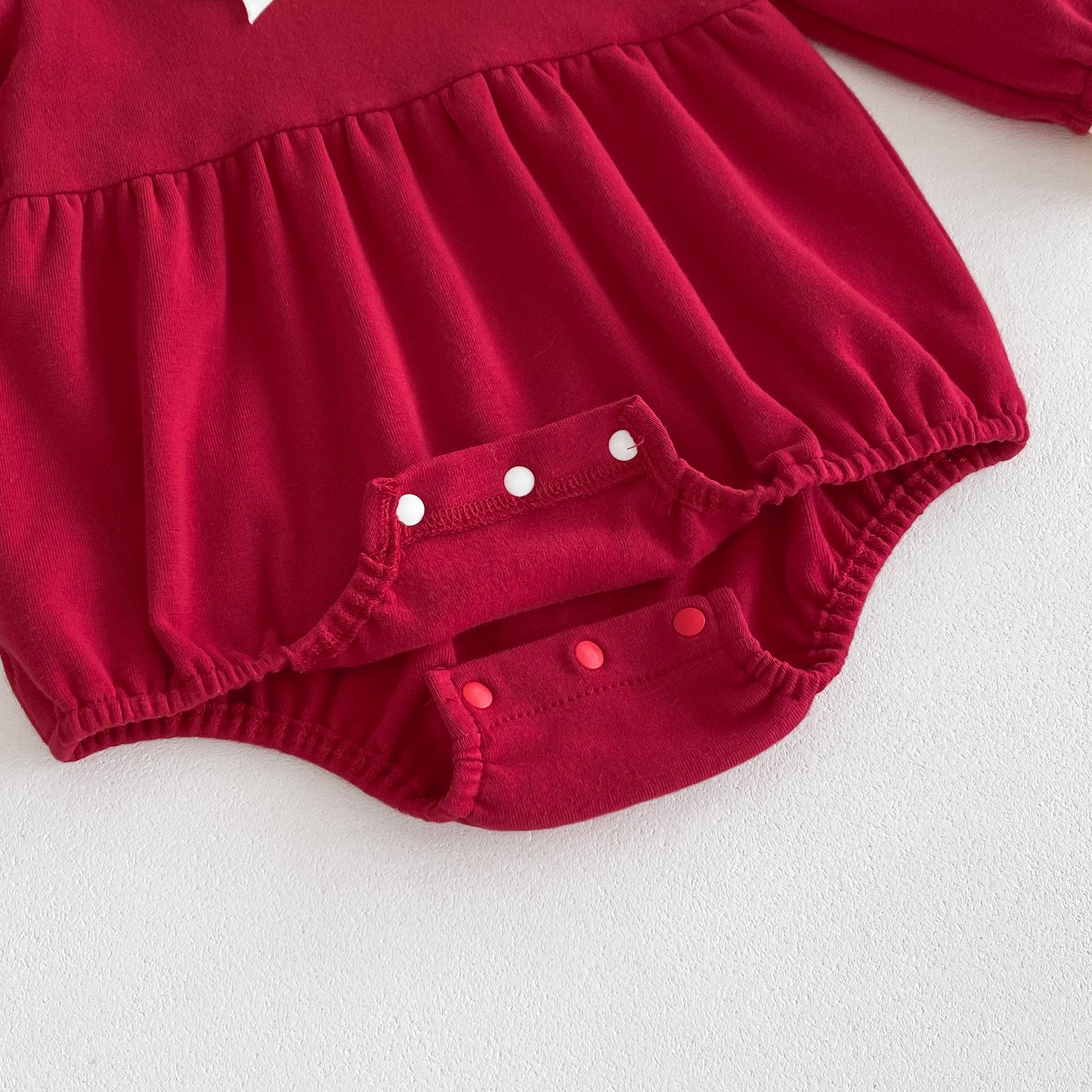 Spring red long sleeves onesie with white collar for baby girls, featuring a patchwork design, perfect for spring and autumn wear.