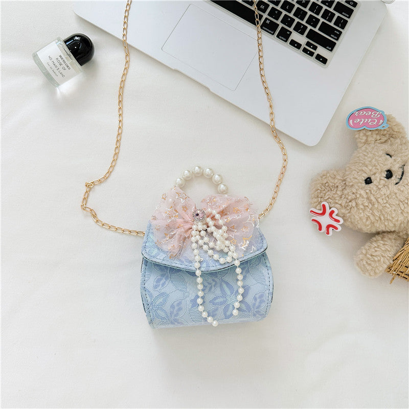 Stylish Floral Carry-On Girls’ Portable Beaded Princess Crossbody bag in various colors with floral patterns.