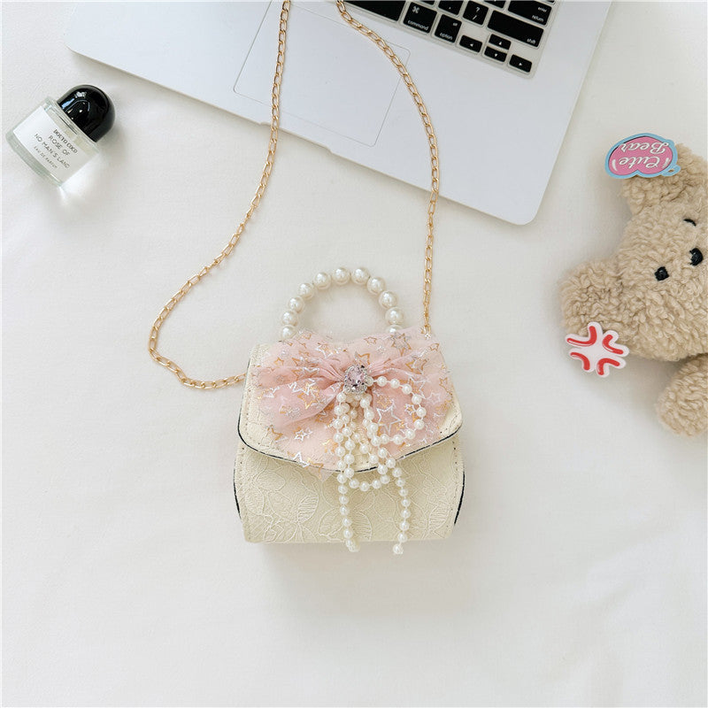 Stylish Floral Carry-On Girls’ Portable Beaded Princess Crossbody bag in various colors with floral patterns.