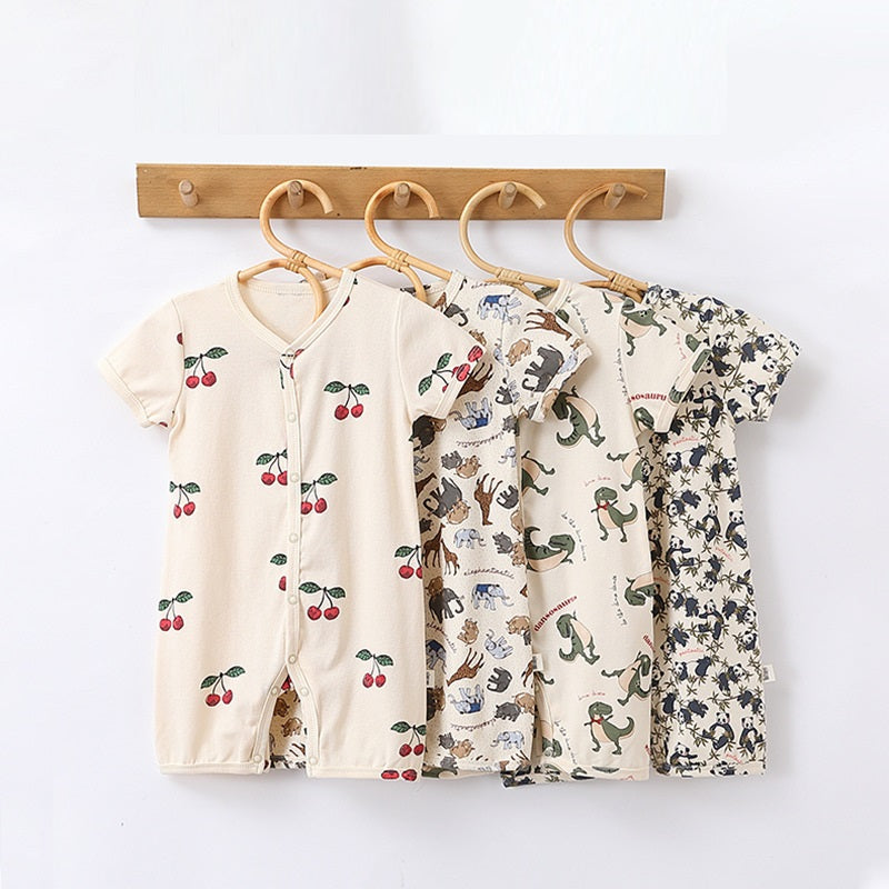 Summer Baby Boys and Girls Cartoon Print Short Sleeves Button Front shirt in black, green, and brown colors, featuring playful cartoon designs.