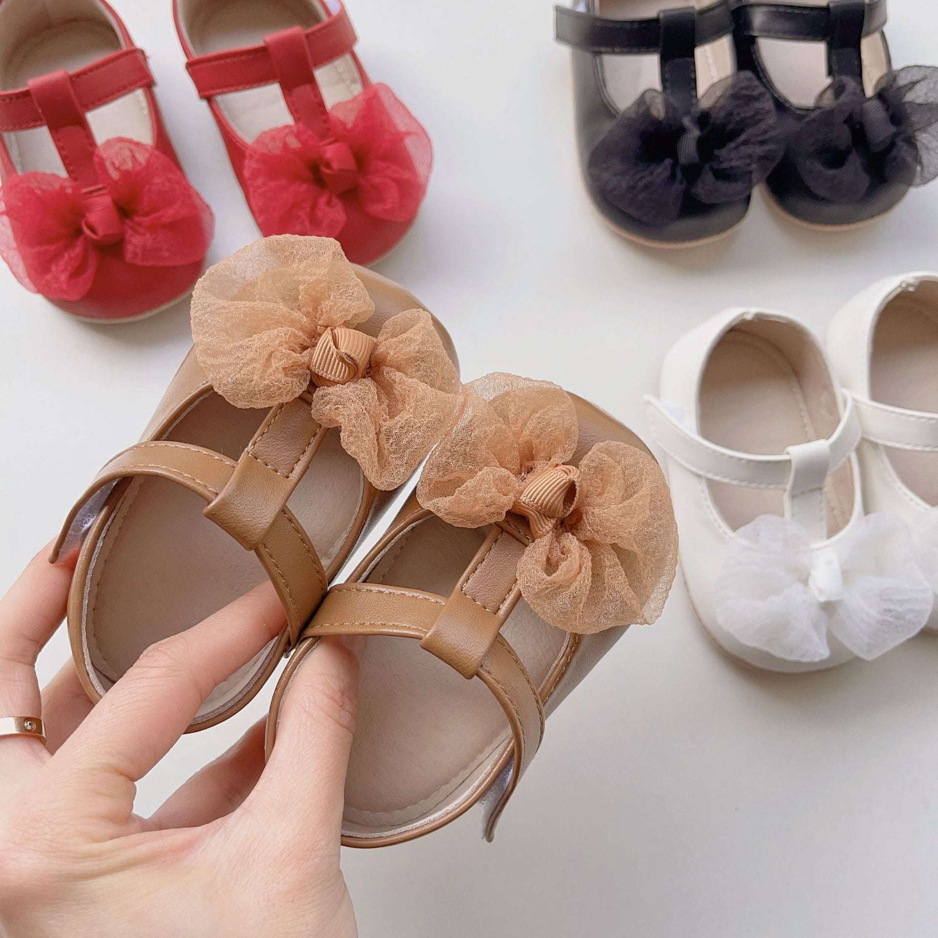 Summer Baby Girl Lace Mesh Bow Toddler Soft-Sole Anti-Slip Walking shoes in various colors with floral design.