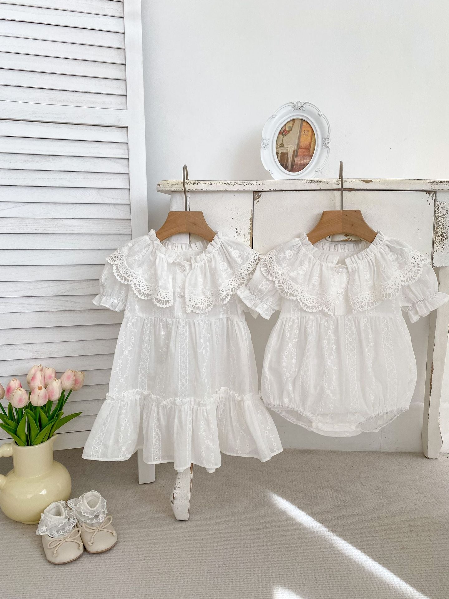 Summer Baby Girls dress featuring floral embroidery and lace collar, available in white and beige, perfect for warm weather.