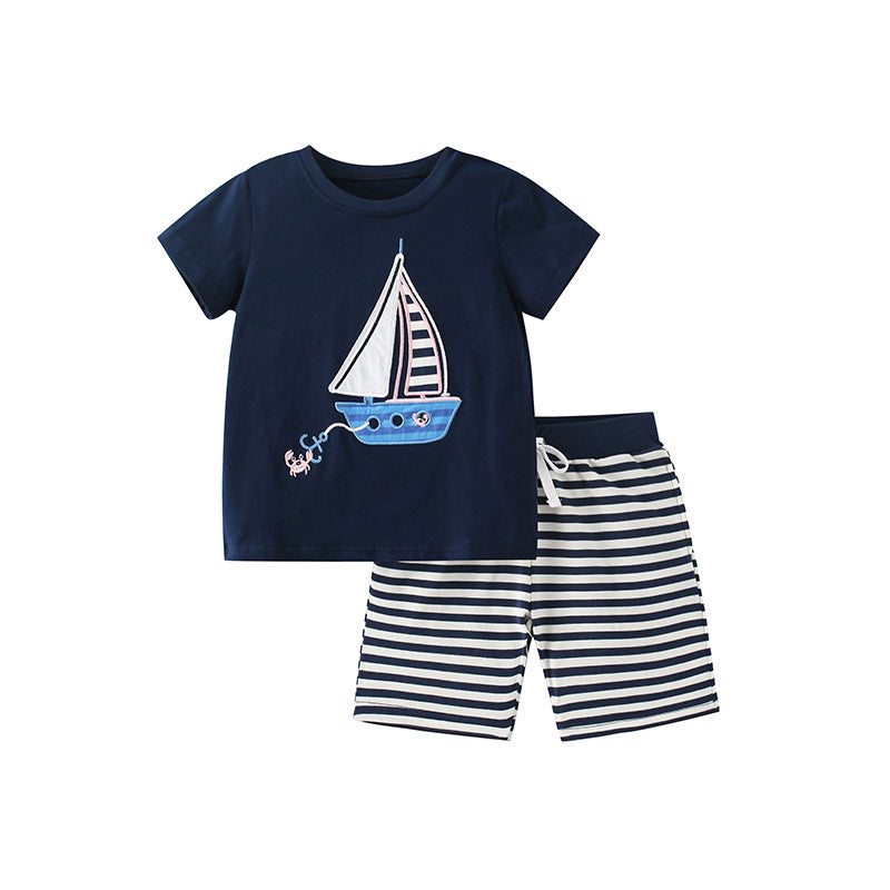 Navy blue t-shirt for boys featuring a cartoon sailboat pattern, perfect for summer wear.