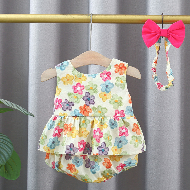 A vibrant sleeveless top dress for baby girls featuring a colorful floral pattern, perfect for summer wear.