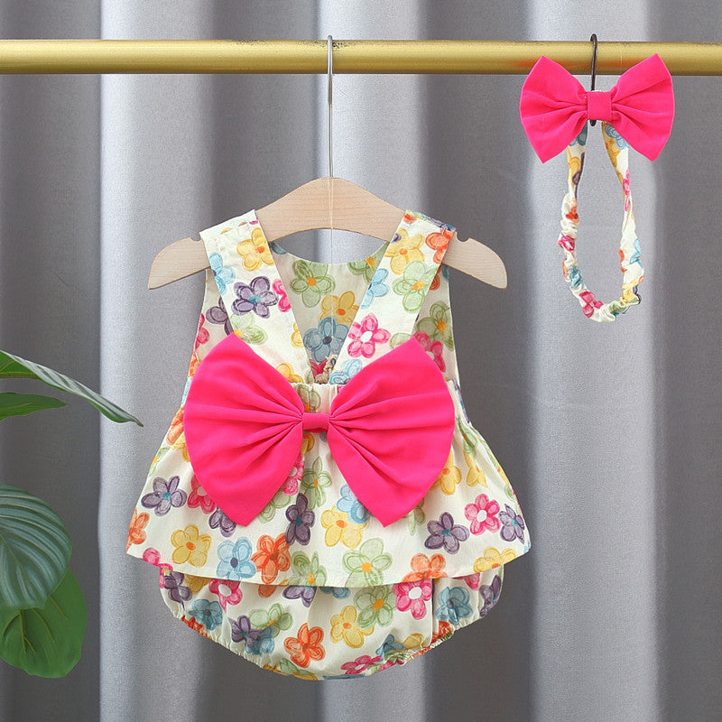 A vibrant sleeveless top dress for baby girls featuring a colorful floral pattern, perfect for summer wear.