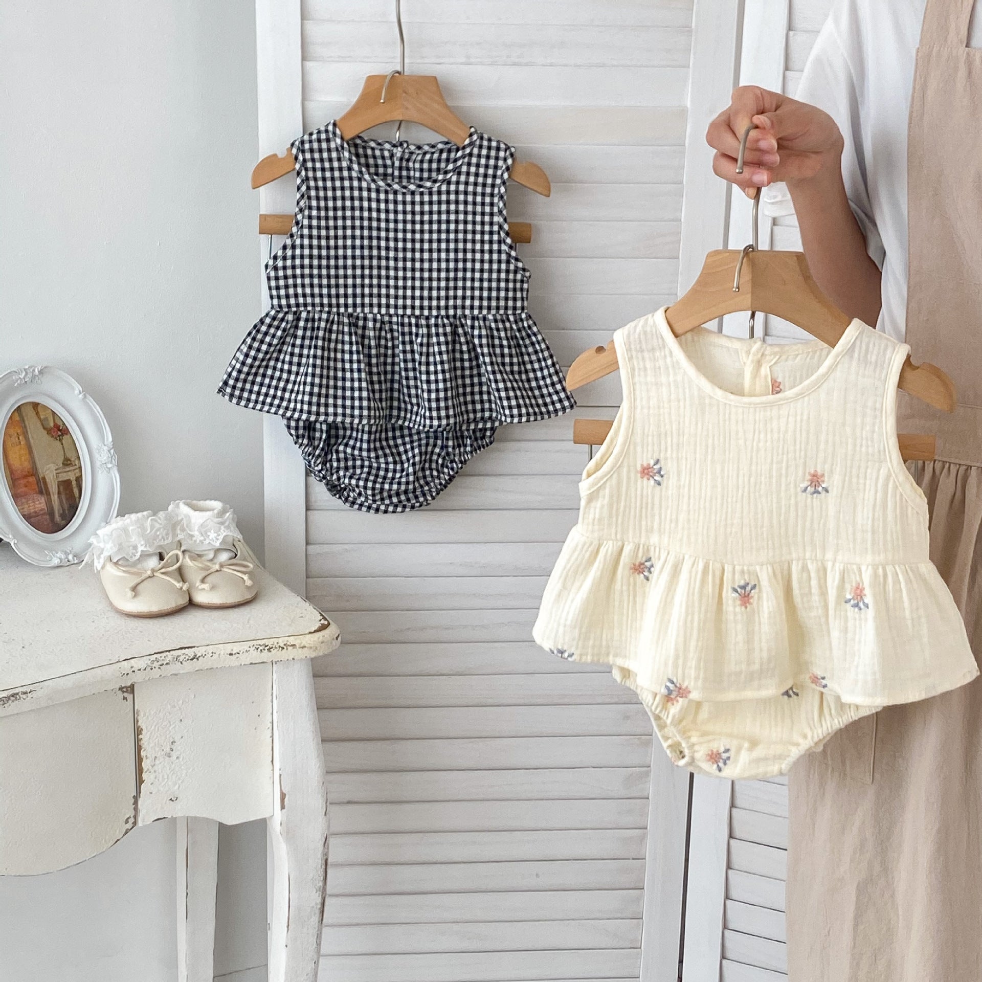 Summer Baby Kids Girls Comfortable Sleeveless Top and Shorts set in white and black with floral and plaid patterns, perfect for warm weather.