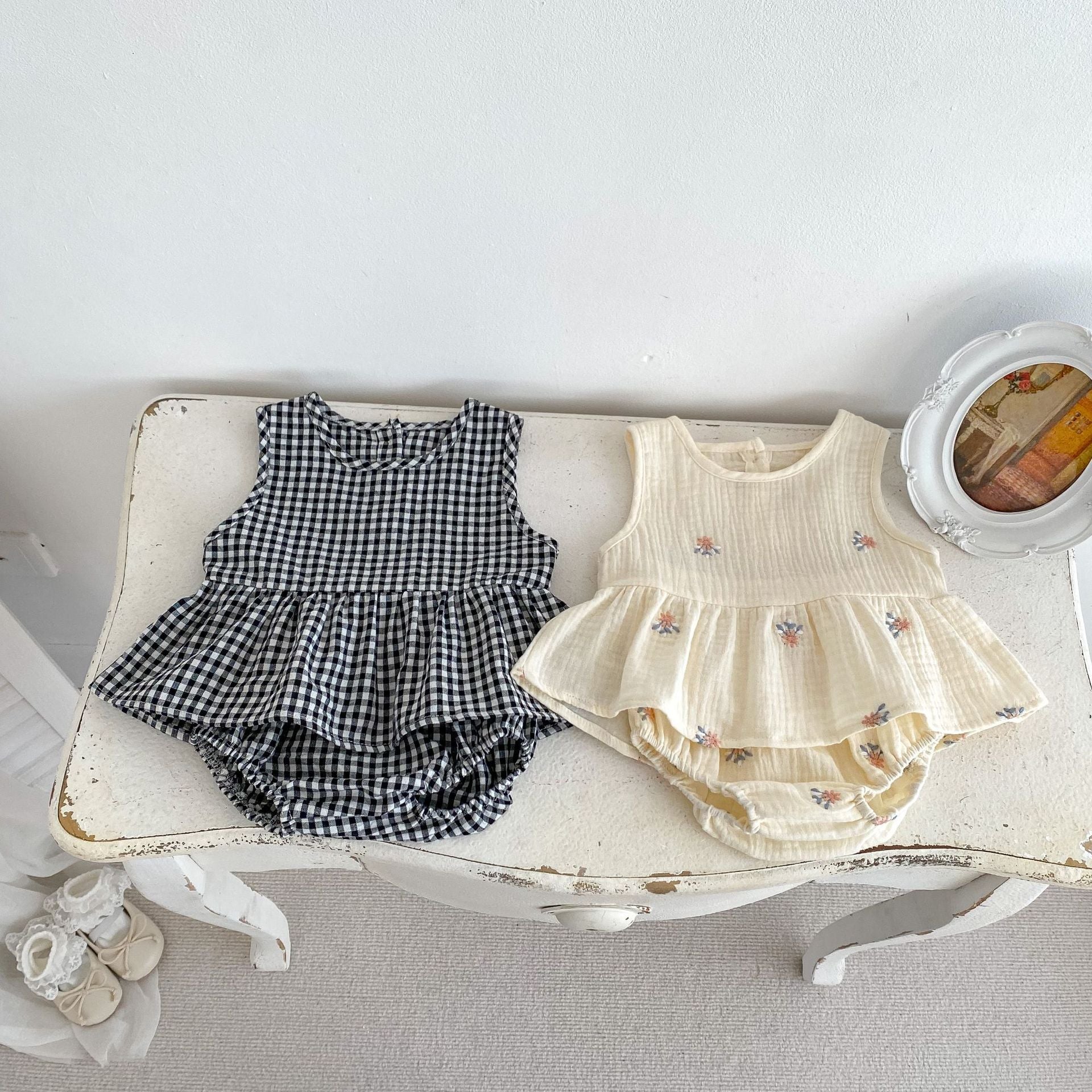 Summer Baby Kids Girls Comfortable Sleeveless Top and Shorts set in white and black with floral and plaid patterns, perfect for warm weather.