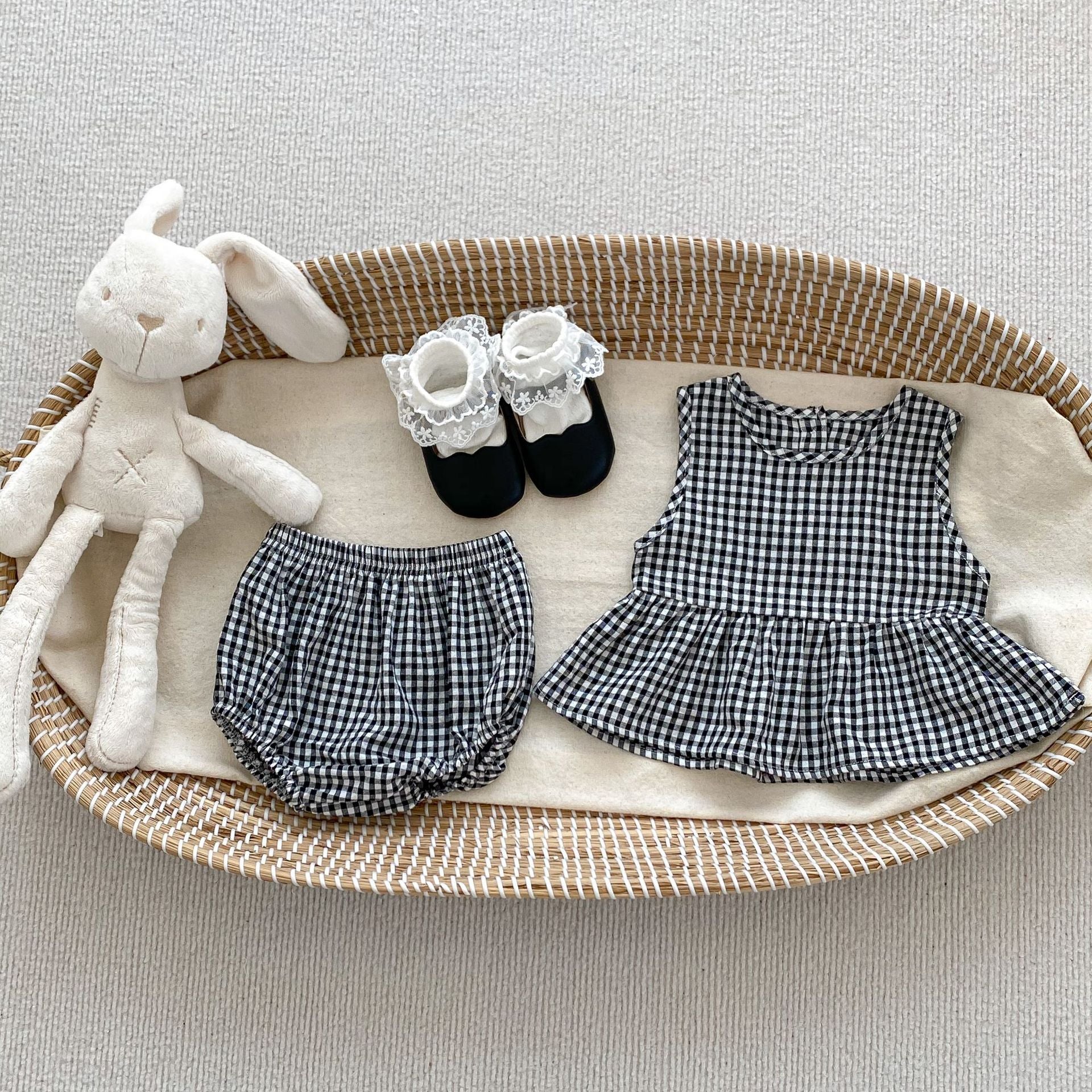 Summer Baby Kids Girls Comfortable Sleeveless Top and Shorts set in white and black with floral and plaid patterns, perfect for warm weather.