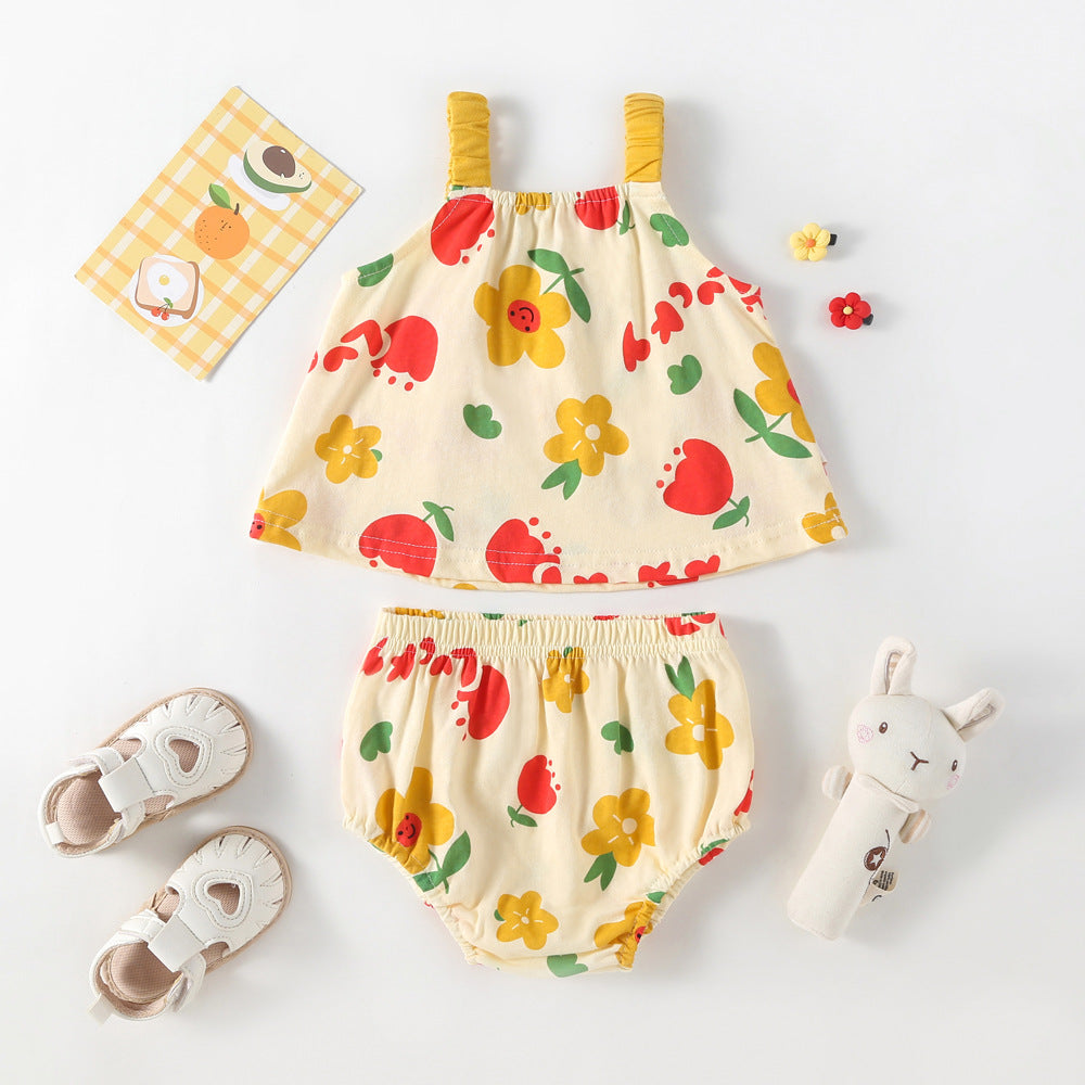 A bright yellow sleeveless dress with a floral pattern designed for baby girls, perfect for summer outings.