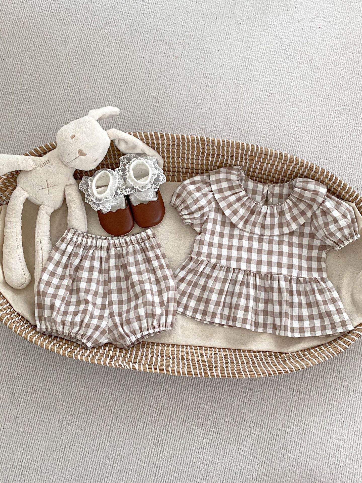 Summer Baby Kids Girls Plaid Short Sleeves Round Collar Top And Shorts in black and brown, made of soft cotton, perfect for warm weather.