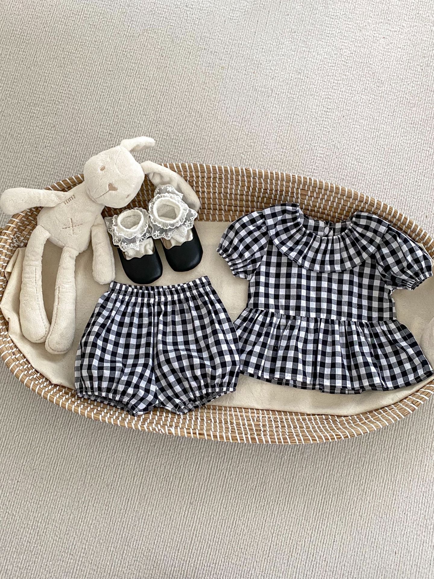 Summer Baby Kids Girls Plaid Short Sleeves Round Collar Top And Shorts in black and brown, made of soft cotton, perfect for warm weather.