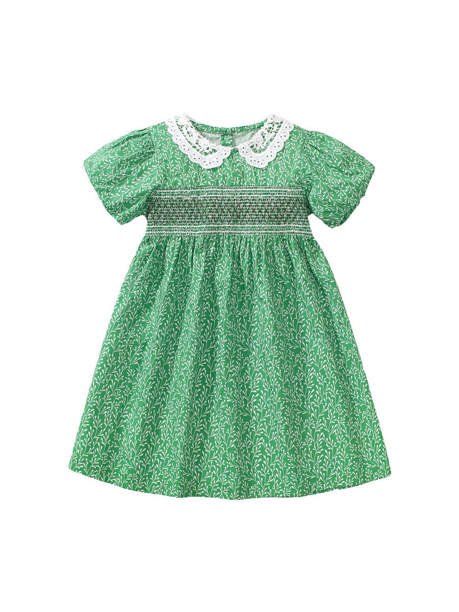 A vibrant green summer dress for girls featuring a lace collar and floral vine print, perfect for warm weather occasions.