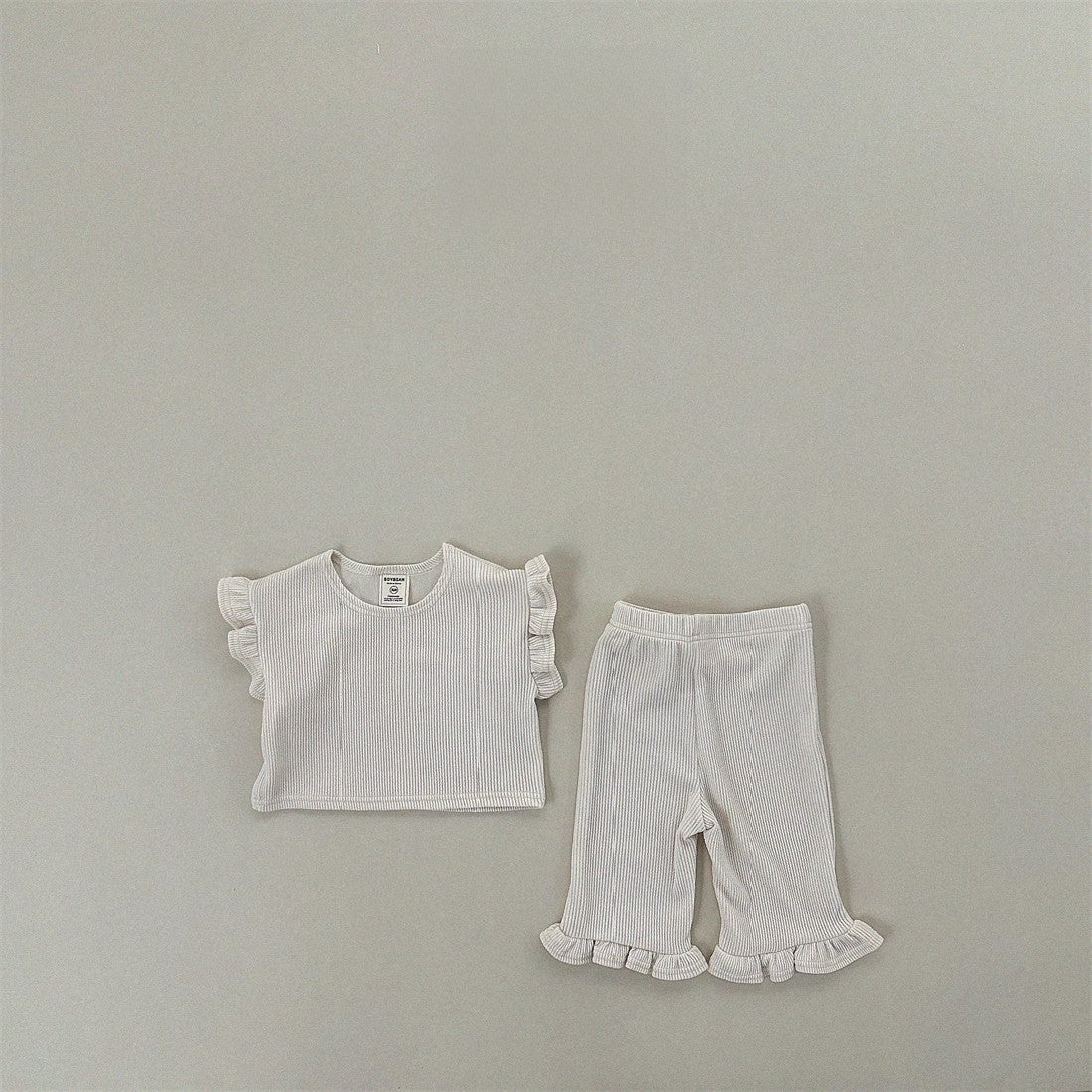 Summer Baby Kids Girls T-Shirt in solid colors with fly sleeves, made from soft cotton, perfect for summer wear.