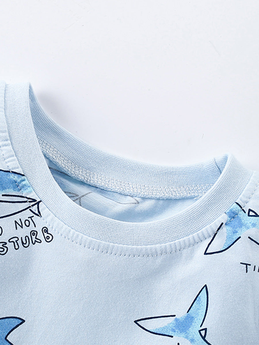 Summer Baby Kids Unisex Marine Sharks Cartoon Pattern Shorts in blue, featuring playful shark designs, perfect for summer wear.