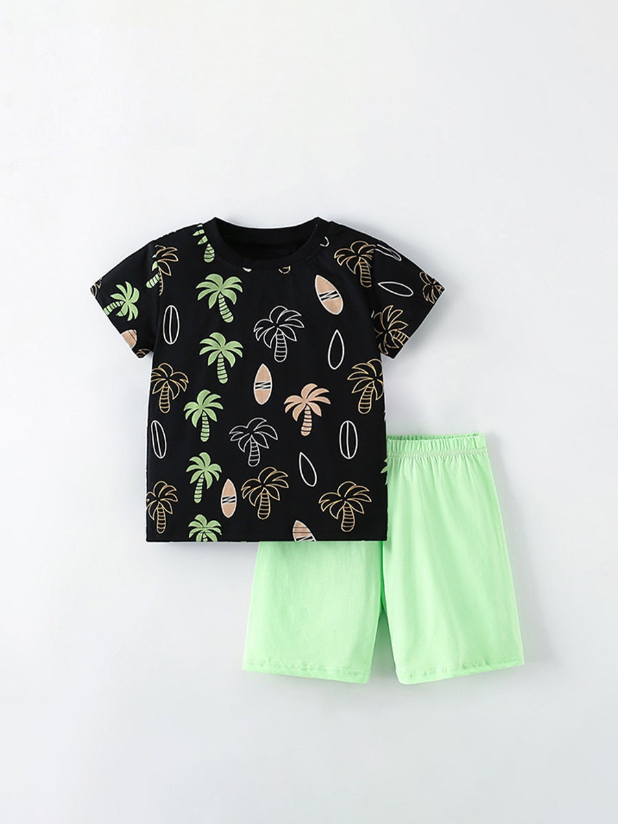 A stylish black short-sleeve shirt for kids featuring a tropical coconut tree pattern, perfect for summer wear.