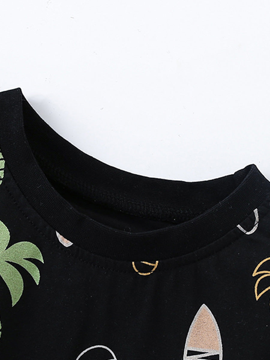 A stylish black short-sleeve shirt for kids featuring a tropical coconut tree pattern, perfect for summer wear.