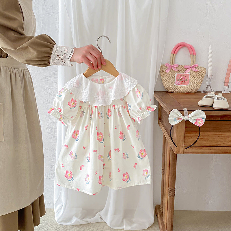 Summer girls onesies featuring a floral pattern and embroidery collar, available in beige and apricot colors.