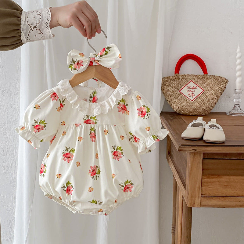 A cute summer top for girls featuring a floral pattern, short sleeves, and a hollow out ruffle collar in beige and apricot colors.