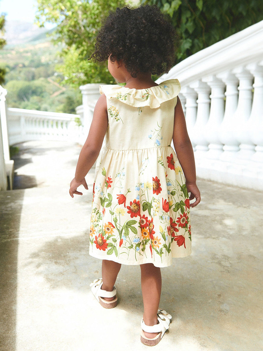 A beige sleeveless dress with a floral pattern, perfect for summer wear for girls.