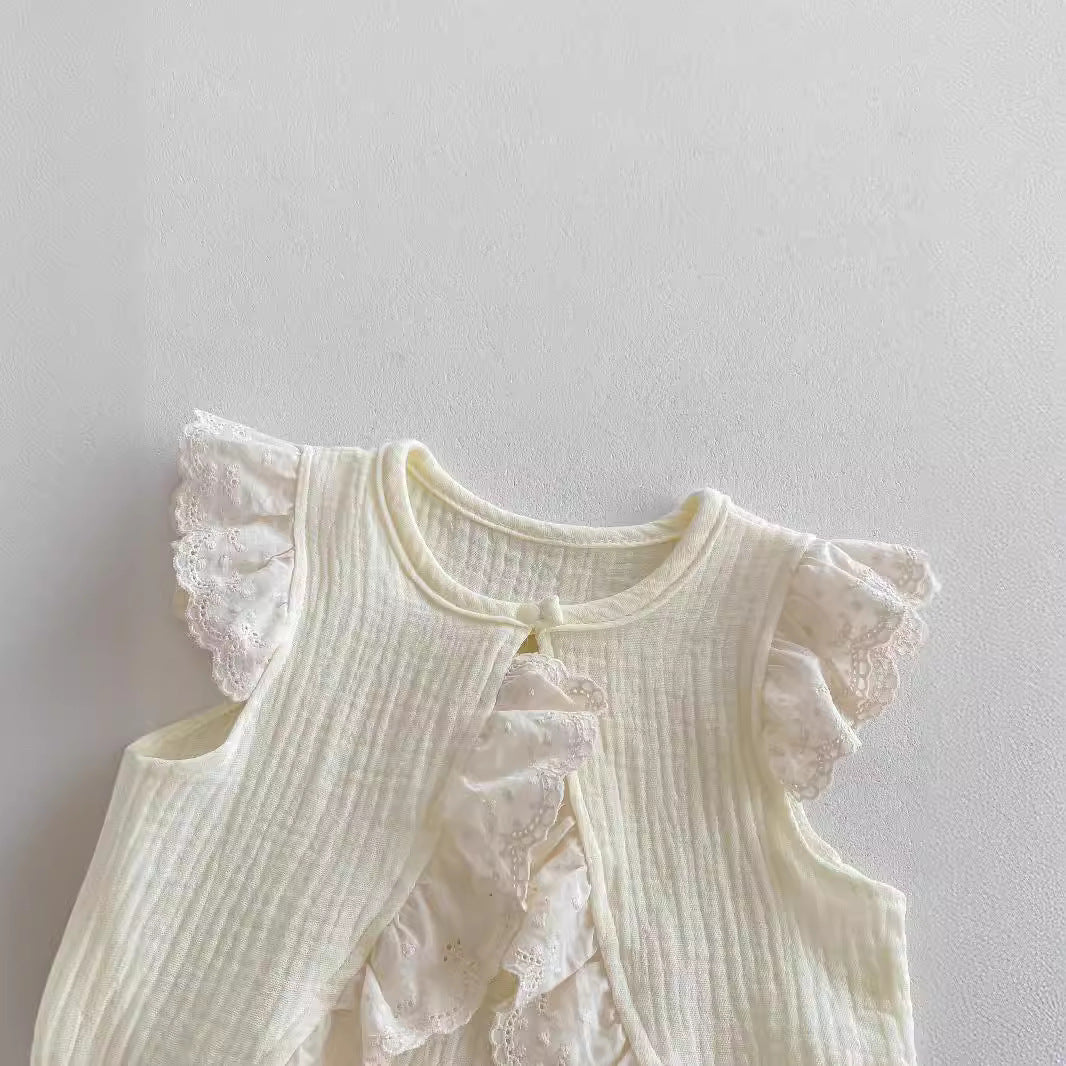 A stylish apricot dress for baby girls featuring fly sleeves and hollow out lace trim, perfect for summer wear.