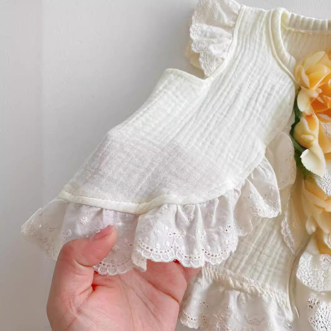 A stylish apricot dress for baby girls featuring fly sleeves and hollow out lace trim, perfect for summer wear.