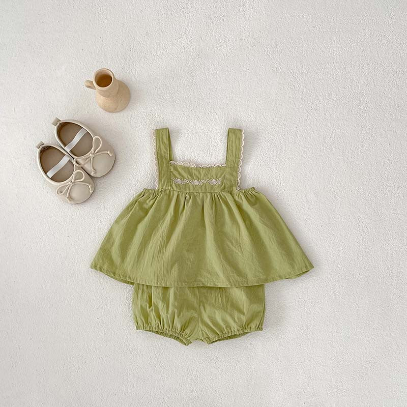 A stylish baby girl's sleeveless dress with lace trim, available in green and beige, perfect for summer wear.