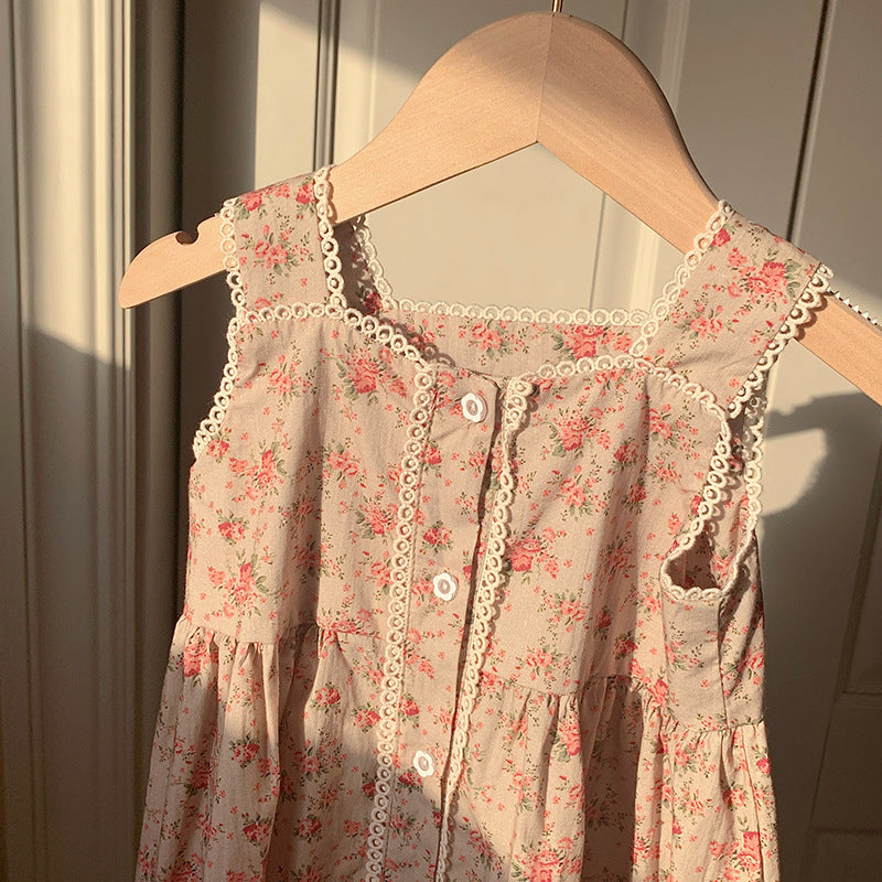 A charming pink vintage floral dress for girls, featuring a sleeveless design and single-breasted front, perfect for summer outings.