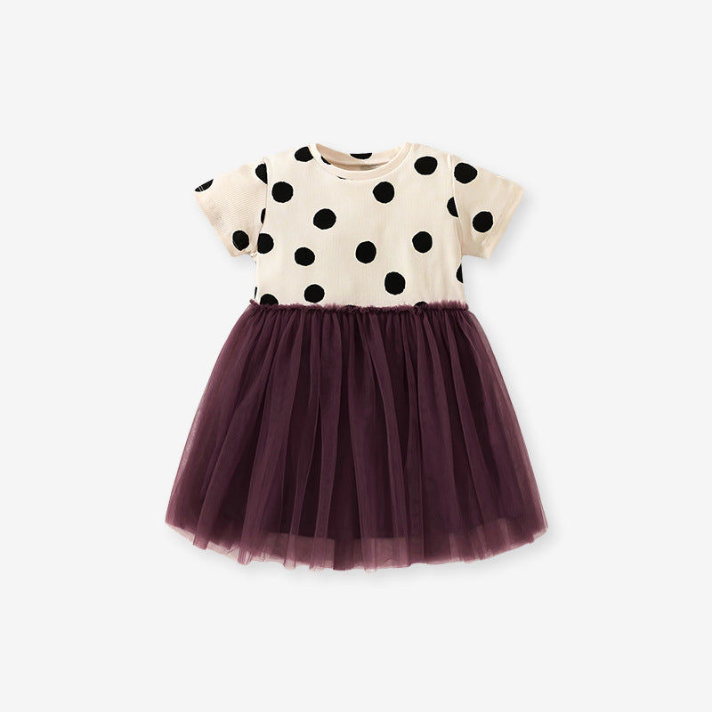 A stylish summer dress for girls featuring short sleeves, a polka dot pattern, and mesh patchwork, perfect for warm weather.