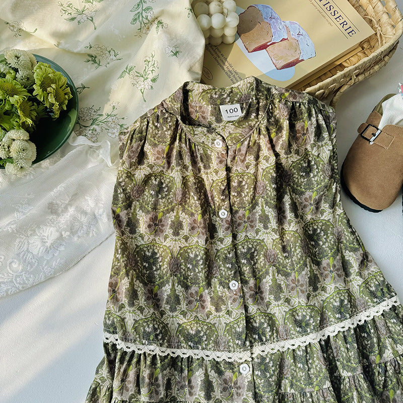 A vibrant green sleeveless vintage style dress for girls, featuring a floral pattern and single-breasted design, perfect for summer wear.