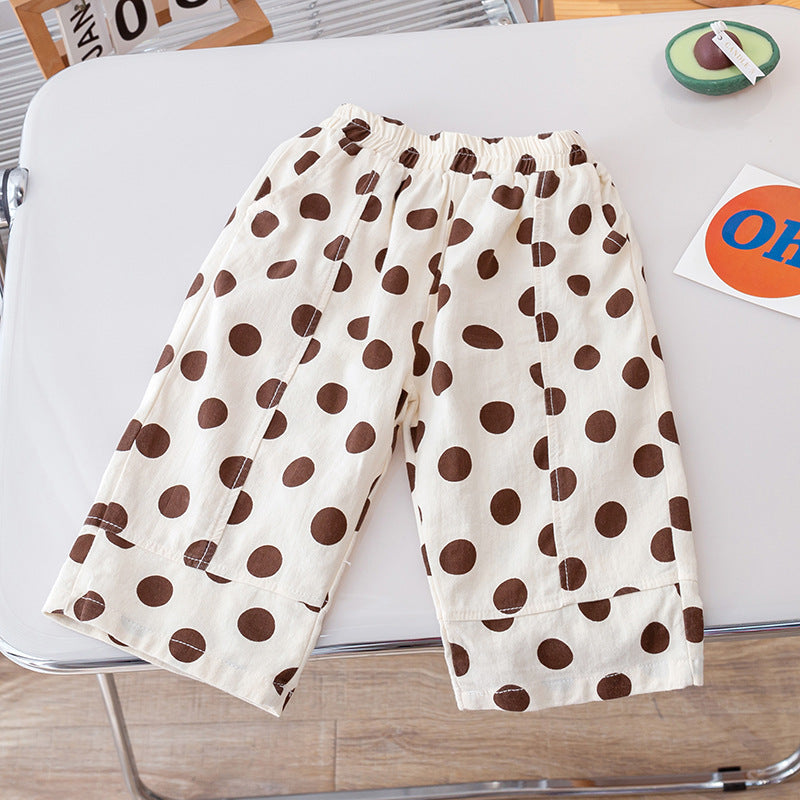 Summer Kids Girls Casual Pants featuring a soft, breathable fabric with a playful polka dots pattern in pink, green, and coffee colors.