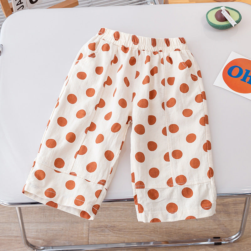 Summer Kids Girls Casual Pants featuring a soft, breathable fabric with a playful polka dots pattern in pink, green, and coffee colors.