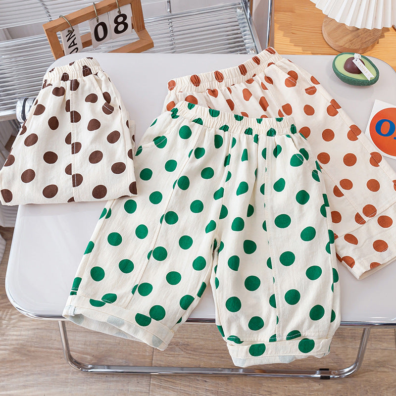 Summer Kids Girls Casual Pants featuring a soft, breathable fabric with a playful polka dots pattern in pink, green, and coffee colors.