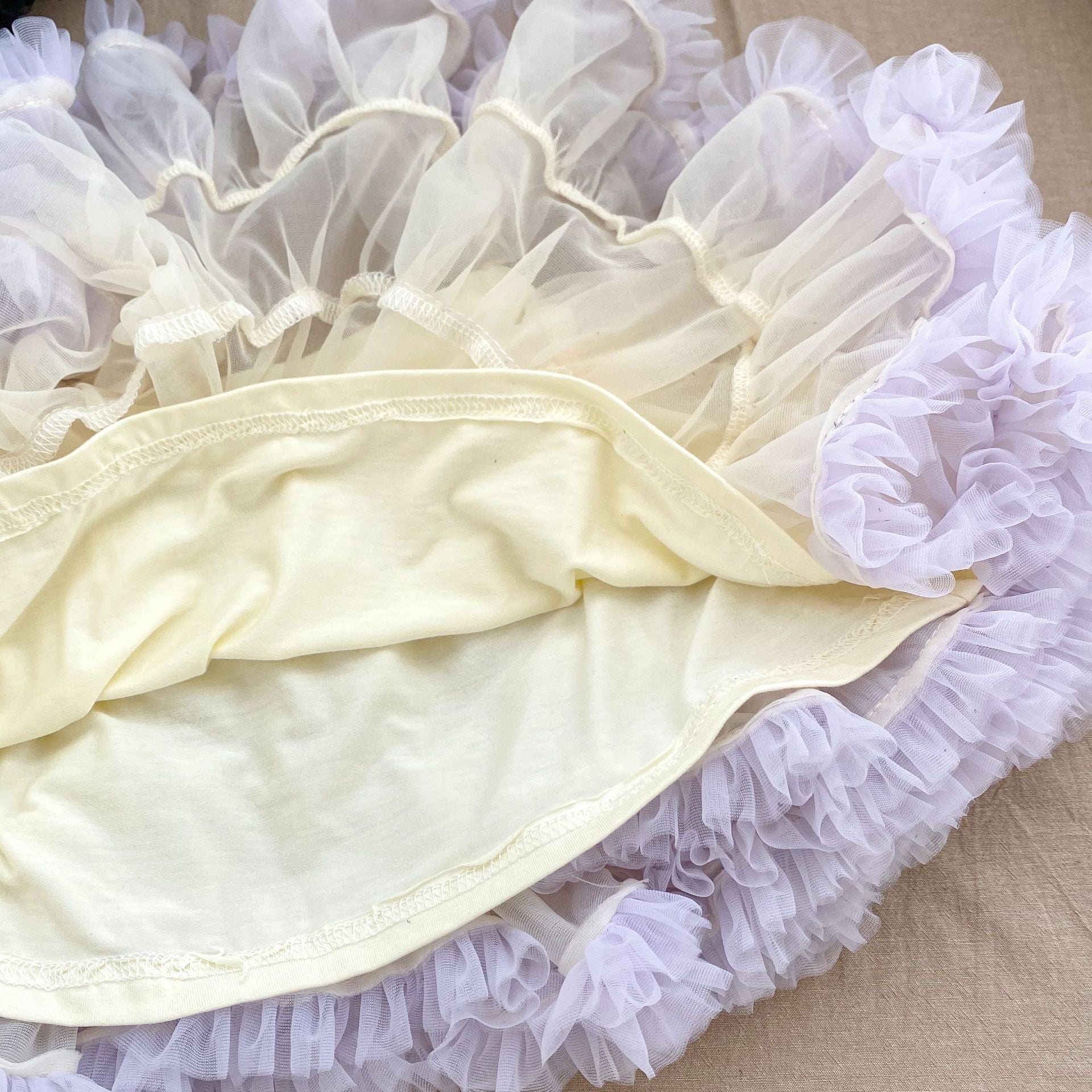 A stylish Summer New Arrival Baby Girl Thin Mesh Tutu Skirt in vibrant colors, showcasing its lightweight and breathable design.