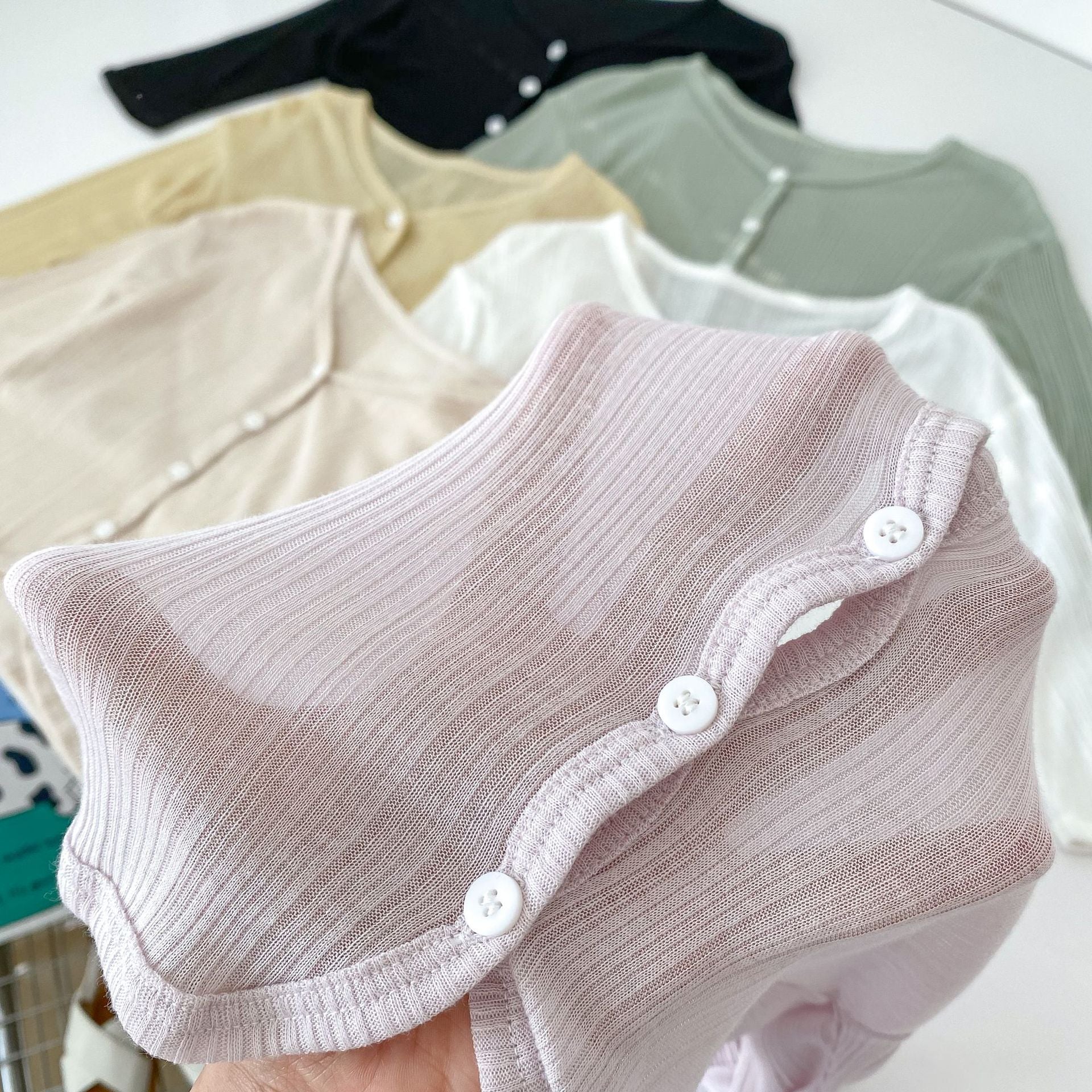 A stylish Summer New Arrival Baby Kids Girls Breathable Thin V Neck Long Sleeves top in various colors, perfect for warm weather.