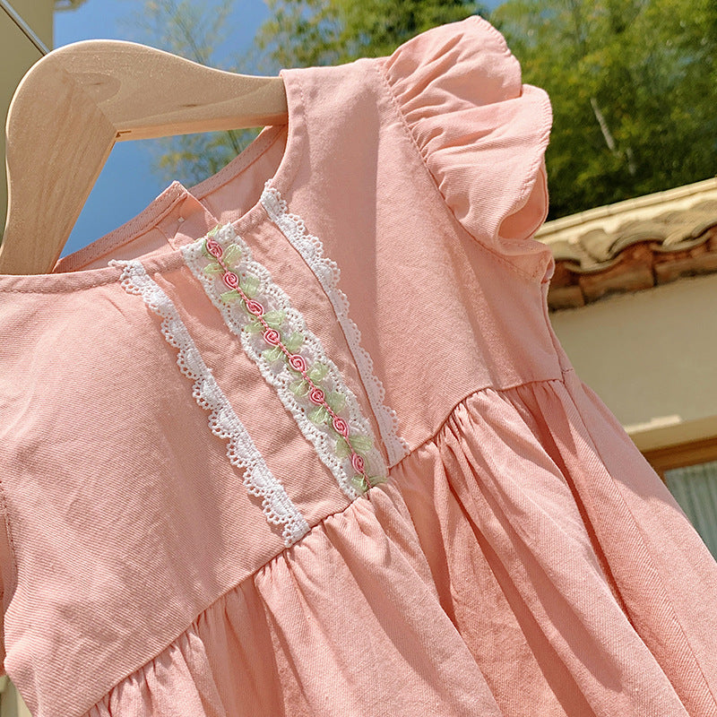 A stylish summer dress for girls featuring fly sleeves and a lace pattern, available in pink and green colors.