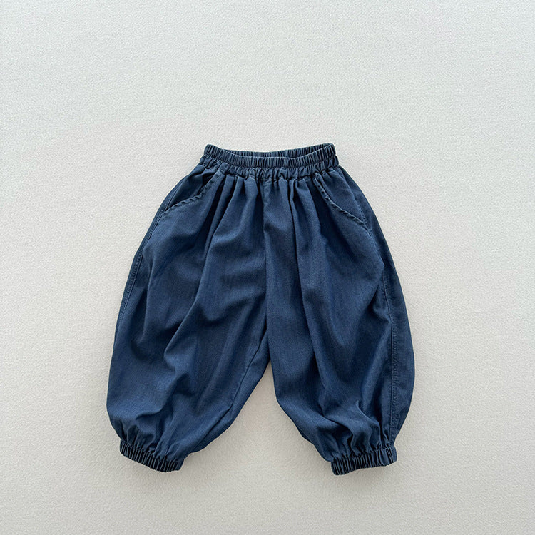 A stylish unisex blue denim with elastic waistband for kids, perfect for summer wear.