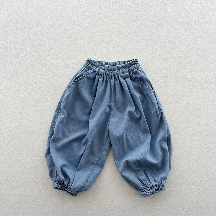 A stylish unisex blue denim with elastic waistband for kids, perfect for summer wear.