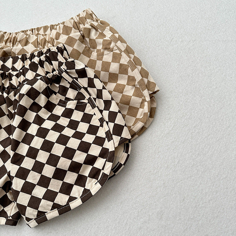 Unisex cotton shorts featuring an argyle geometric pattern in khaki and coffee colors, perfect for summer wear for kids.